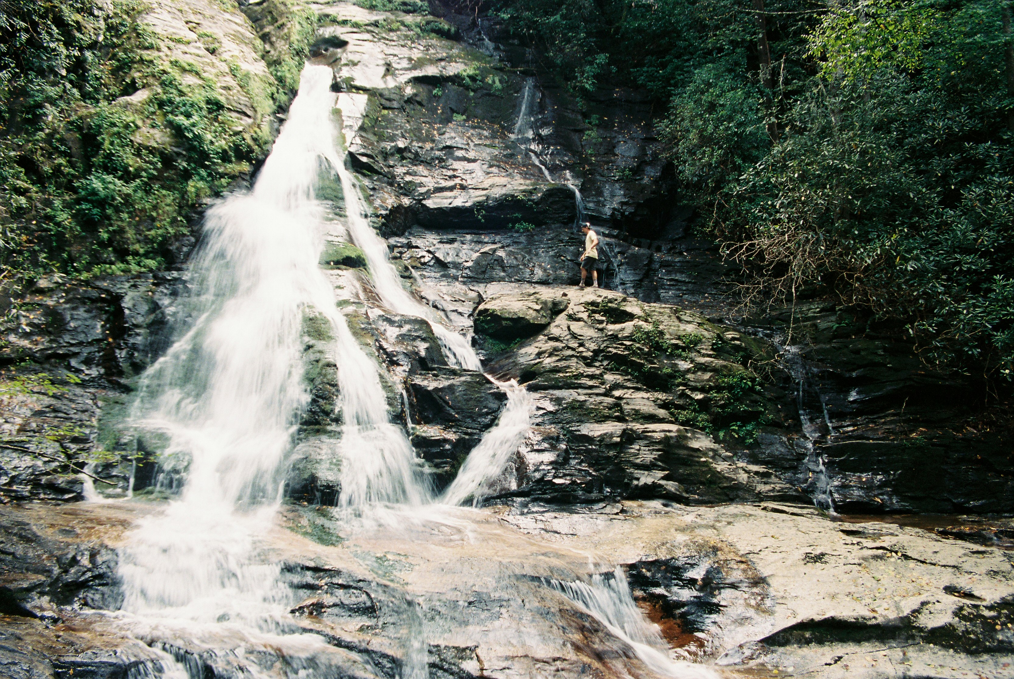 water falls on rocky mountain